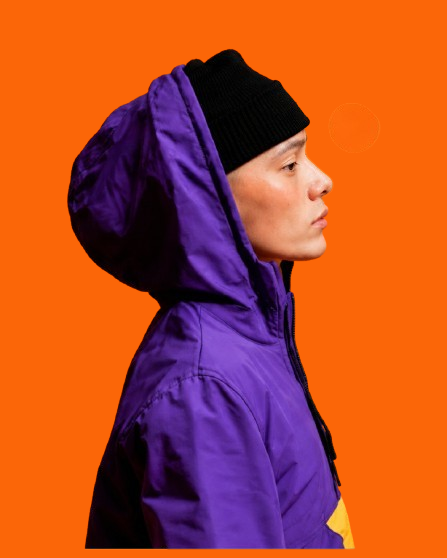 a boy with purple jacket